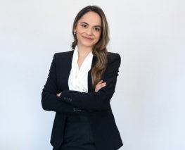 a woman in a black suit